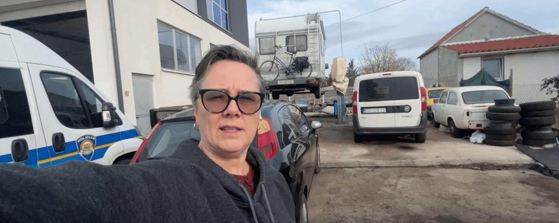 kenny the van on the lift at the mechanics